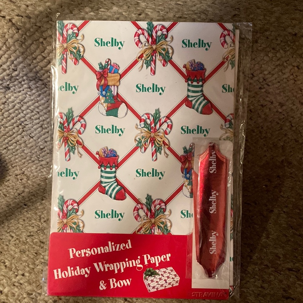 Holiday Wrapping Paper Personalized with “Shelby”  Name on Paper and Bow